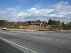 Great piece of commercial property on a level lot north of hwy 92 that will host a variety of options for your new business. Property could be divided into 2 lots if desired. Has already been zoned to have a entrances on both sides of the property Don't miss this opportunity to start your bus on the new hwy 92 extension Property is at the corner of Malone rd  Possible owner financing available to the right party Call for more information at 404 644 9948